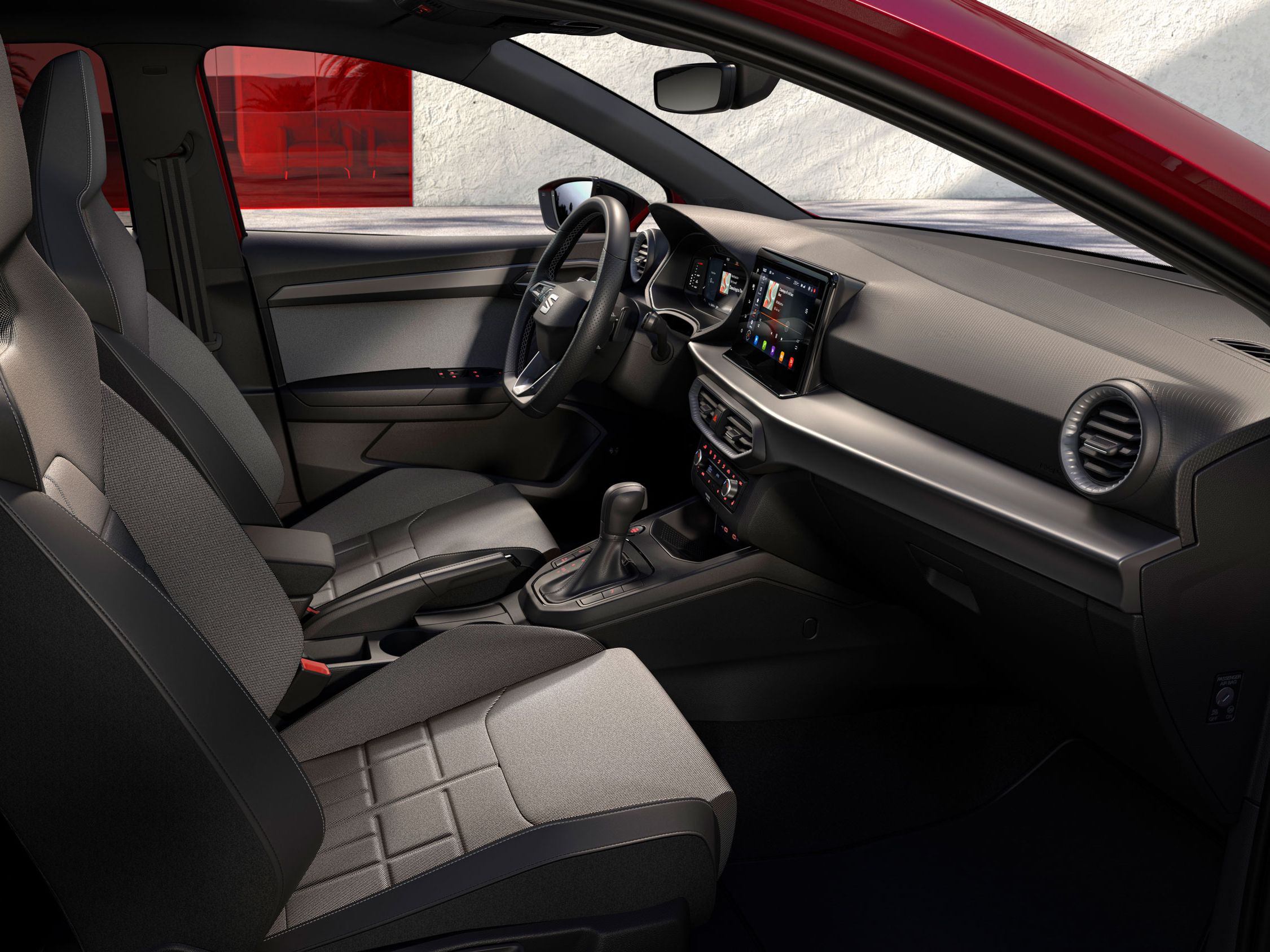 Innenraumdetails des SEAT Ibiza, inklusive geprägter Sportsitze für FR in NUANCE.